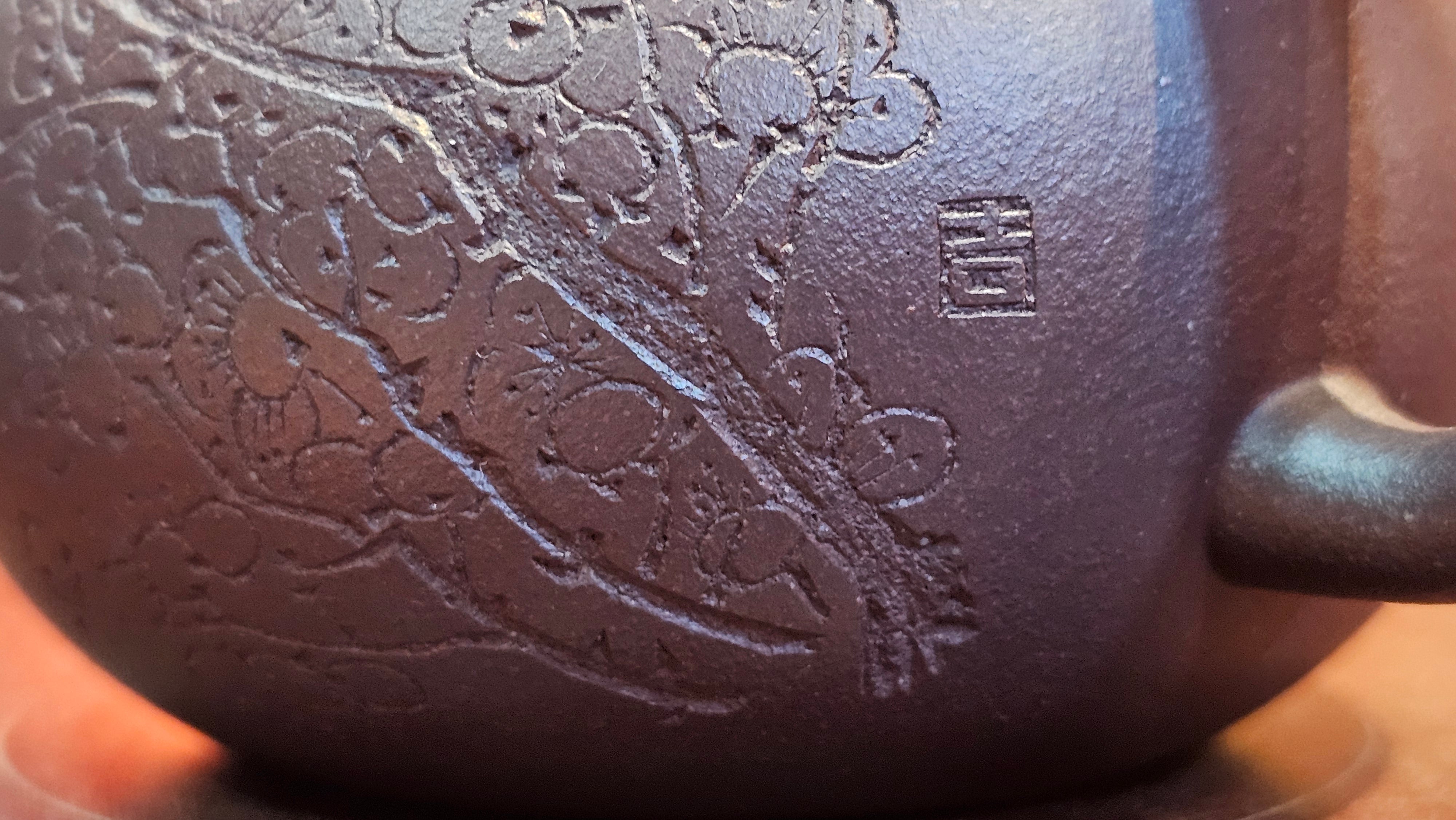 Pan Hu 番壶, 193.8ml, Da Shui Tan Zi Ni 大水潭紫泥, by our Craftsman Zhang Huan 张欢, with Plum Blossoms and Calligraphy Engraving by Craftsman Peng Peng 芃芃。