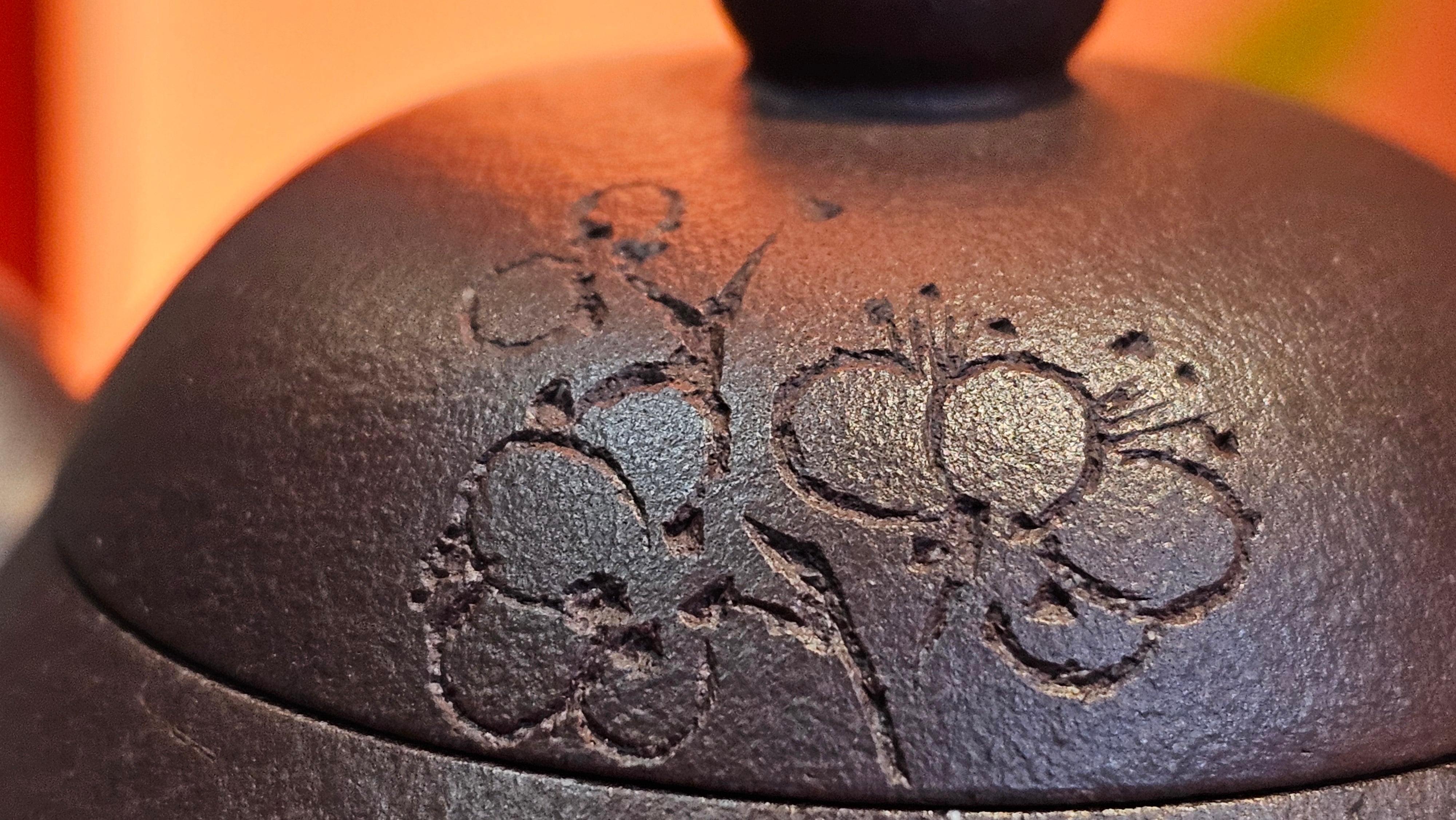 Pan Hu 番壶, 193.8ml, Da Shui Tan Zi Ni 大水潭紫泥, by our Craftsman Zhang Huan 张欢, with Plum Blossoms and Calligraphy Engraving by Craftsman Peng Peng 芃芃。