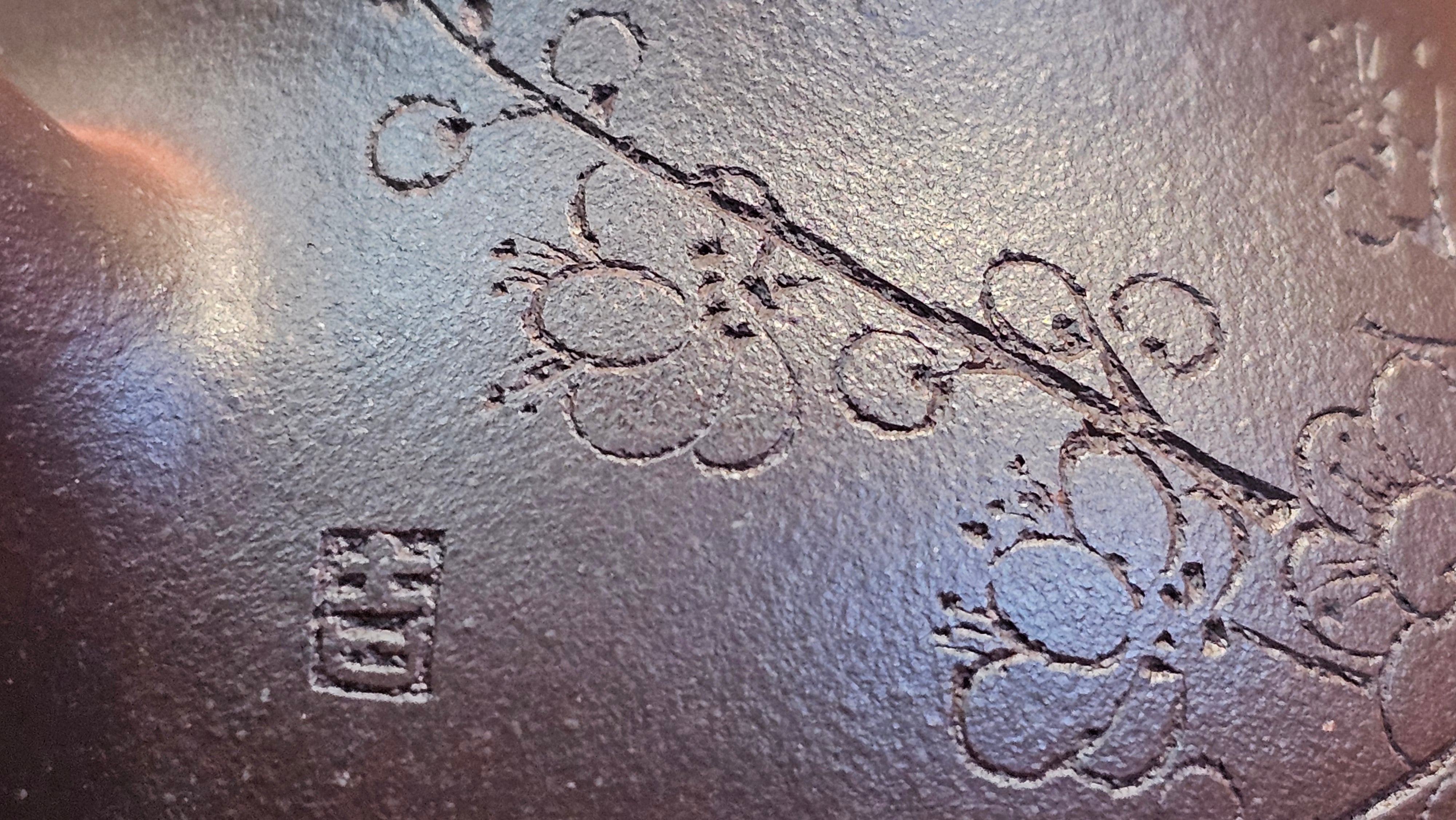 Pan Hu 番壶, 193.8ml, Da Shui Tan Zi Ni 大水潭紫泥, by our Craftsman Zhang Huan 张欢, with Plum Blossoms and Calligraphy Engraving by Craftsman Peng Peng 芃芃。